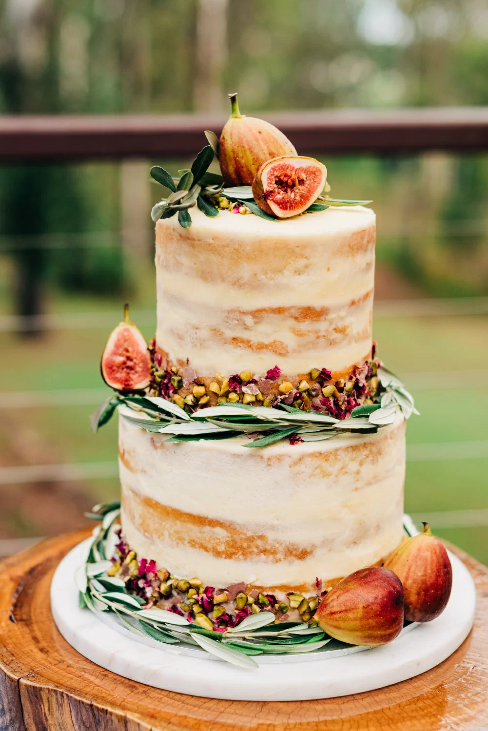 vertical-selective-closeup-shot-cake-decorated-with-figs-nuts.jpg